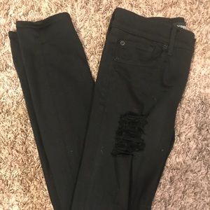 Express black destroyed denim jeggings. Size 2L